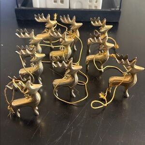 Set of 10 brass ornaments.